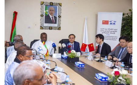 جلسة محادثات سياسية رفيعة بين حزب الإنصاف والحزب الشيوعي الصيني