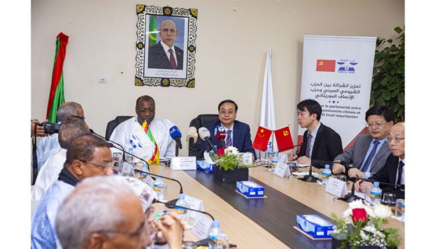 جلسة محادثات سياسية رفيعة بين حزب الإنصاف والحزب الشيوعي الصيني